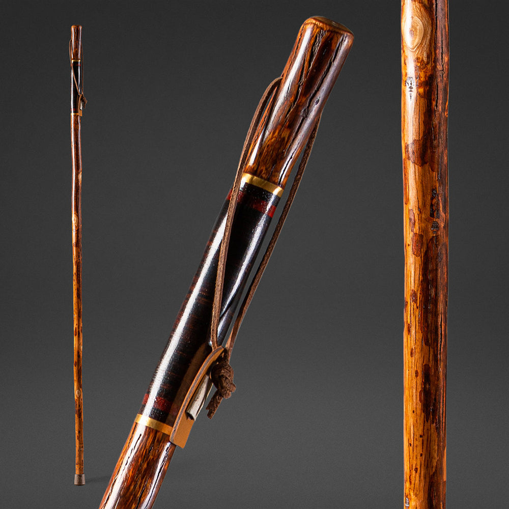 Handcrafted hickory walking stick with natural finish and ergonomic handle